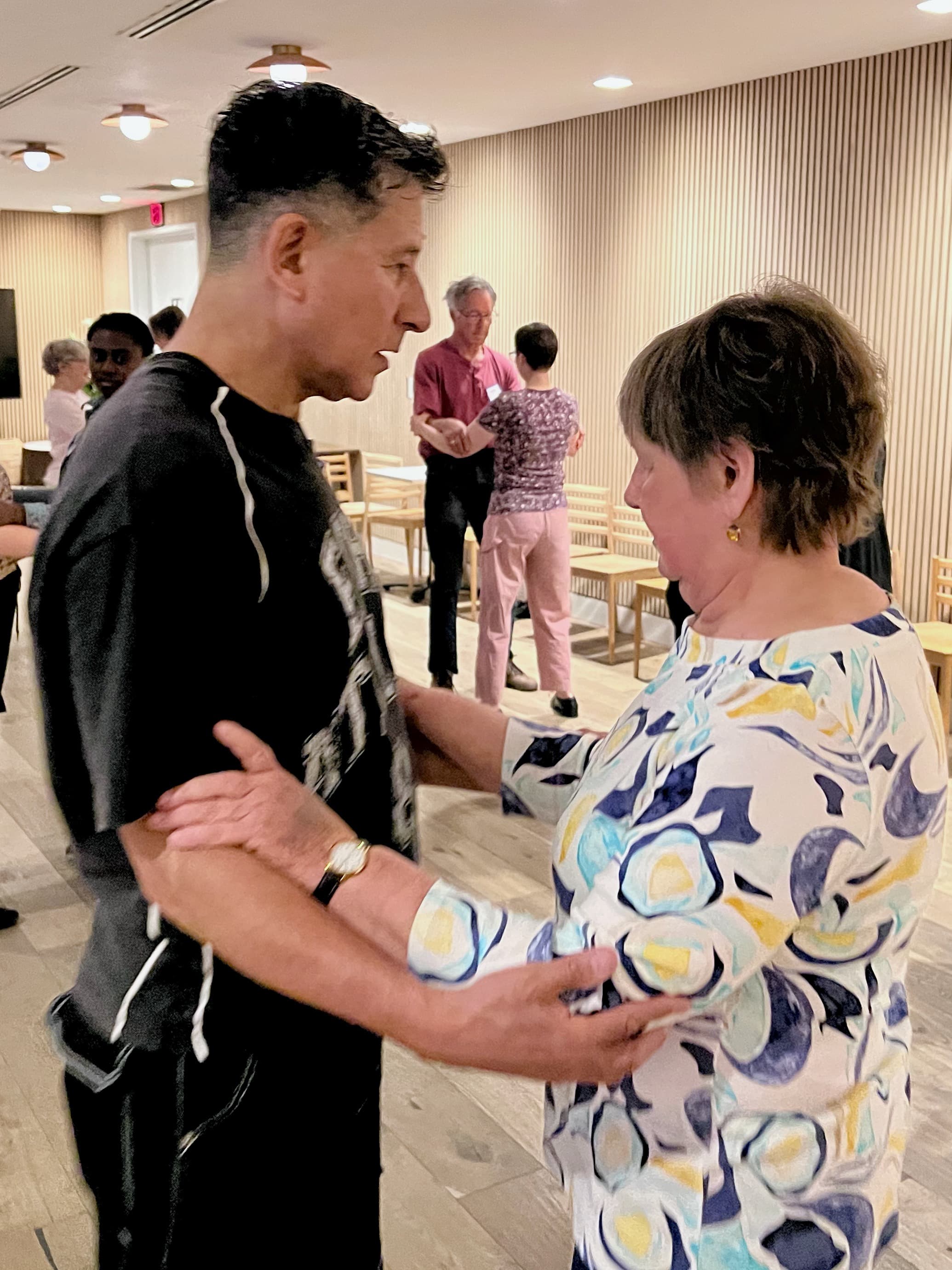 Adapted Tango class participants dancing together